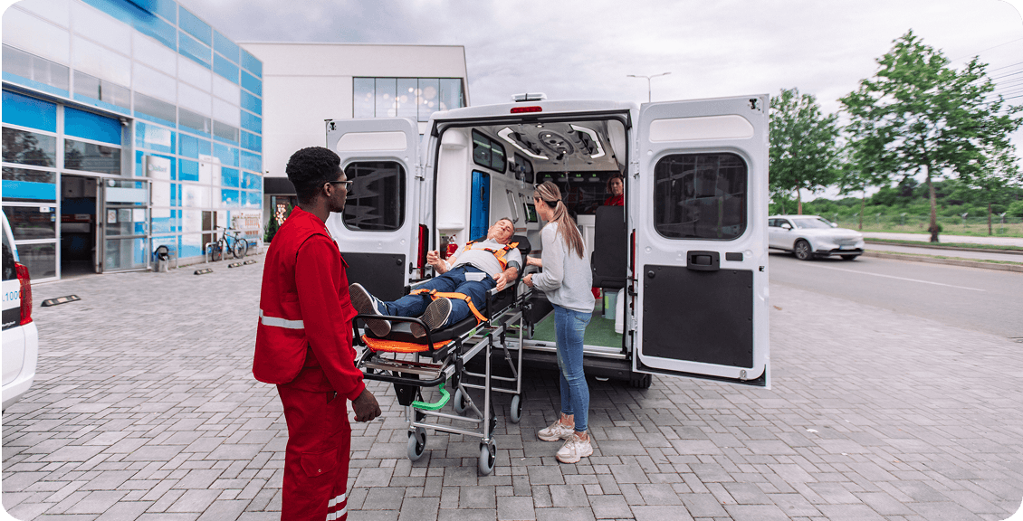 Emergency responders assisting patient